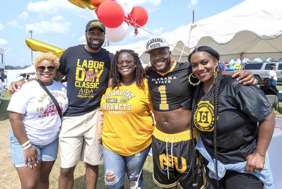 Despite the bright sunlight and broiling temperatures of 100 degrees plus, Hornet alumni fans from around the nation landed in Montgomery such as (L-R) Maya McKenzie, Esq., Clarence Garden, Kyomi Moore, Perry Morgan Jr., and Yasmin Salina swarmed on the campus for the Labor Day Classic festivities which ended with a victory for the Hornets as they won the classic football game 38-31.