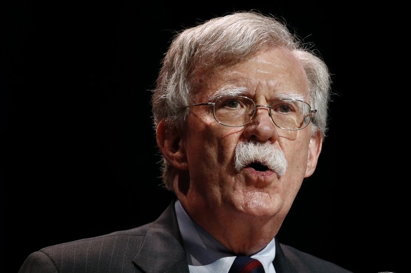 In this July 8, 2019, file photo, national security adviser John Bolton speaks at the Christians United for Israels annual summit, in Washington. A single paper copy in a nondescript envelope arrived at the White House on Dec. 30. Four weeks later, news of John Bolton’s book manuscript about his time as President Donald Trump’s national security adviser has exploded into public view, sending a jolt through the president’s impeachment trial.