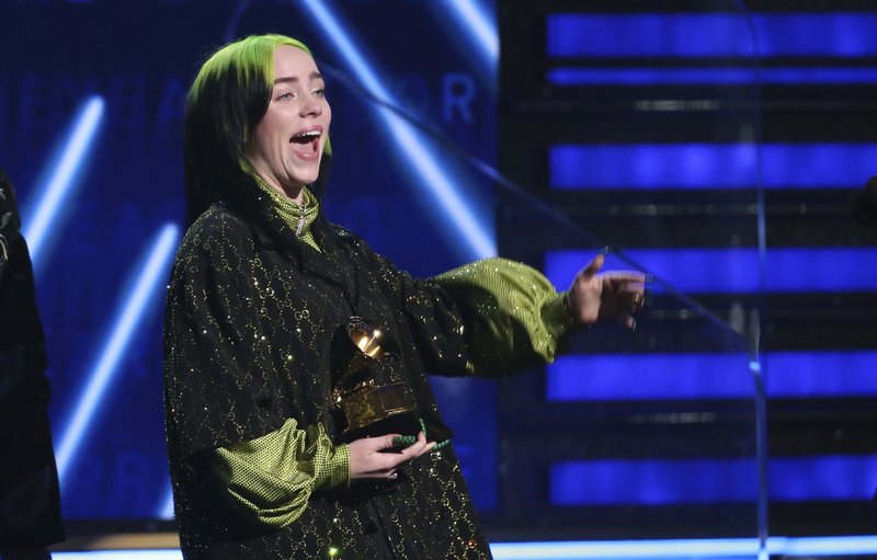 Billie Eilish accepts the award for record of the year for Bad Guy at the 62nd annual Grammy Awards on Sunday, Jan. 26, 2020, in Los Angeles.