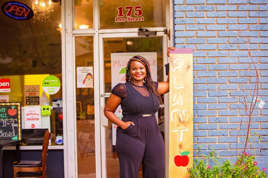 Alumna Quebe Merritt Bradford, Ph.D., stands outside of the relatively new business, Plant Bae, that she and her husband opened located at 123 Lee Street in Montgomery.  She credits every day and every course in her college experience for preparing her for a career full of advancements and achievements.  