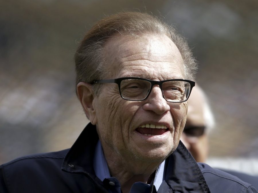 FILE - This April 1, 2013 file photo shows talk show host Larry King attends a season-opening baseball game between the Los Angeles Dodgers and the San Francisco Giants in Los Angeles. King, who interviewed presidents, movie stars and ordinary Joes during a half-century in broadcasting, has died at age 87. Ora Media, the studio and network he co-founded, tweeted that King died Saturday, Jan. 23, 2021 morning at Cedars-Sinai Medical Center in Los Angeles. (AP Photo/Jae C. Hong, File)