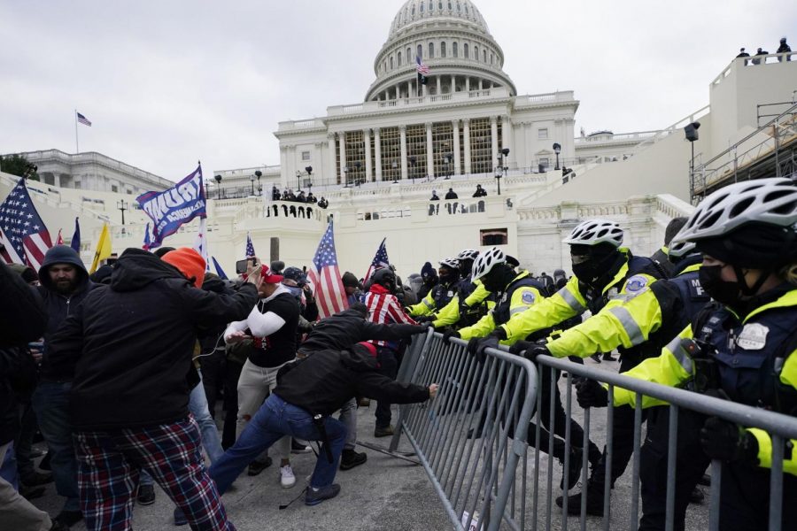 Trump+supporters+try+to+break+through+a+police+barrier%2C+Wednesday%2C+Jan.+6%2C+2021%2C+at+the+Capitol+in+Washington.+%28AP+Photo%2FJulio+Cortez%29