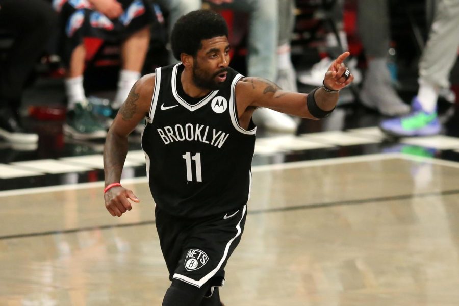 Jun 5, 2021; Brooklyn, New York, USA; Brooklyn Nets point guard Kyrie Irving (11) reacts after making a basket against the Milwaukee Bucks during the second quarter of game one in the Eastern Conference semifinals of the 2021 NBA Playoffs at Barclays Center. Mandatory