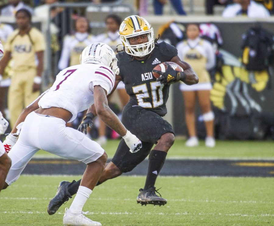 Hornet running back Ezra Gray finds an opening in the Bethune-Cookman defense and sprints past a Wildcat defender as the Alabama State University Hornets go on to defeat the Wildcats 38-24.