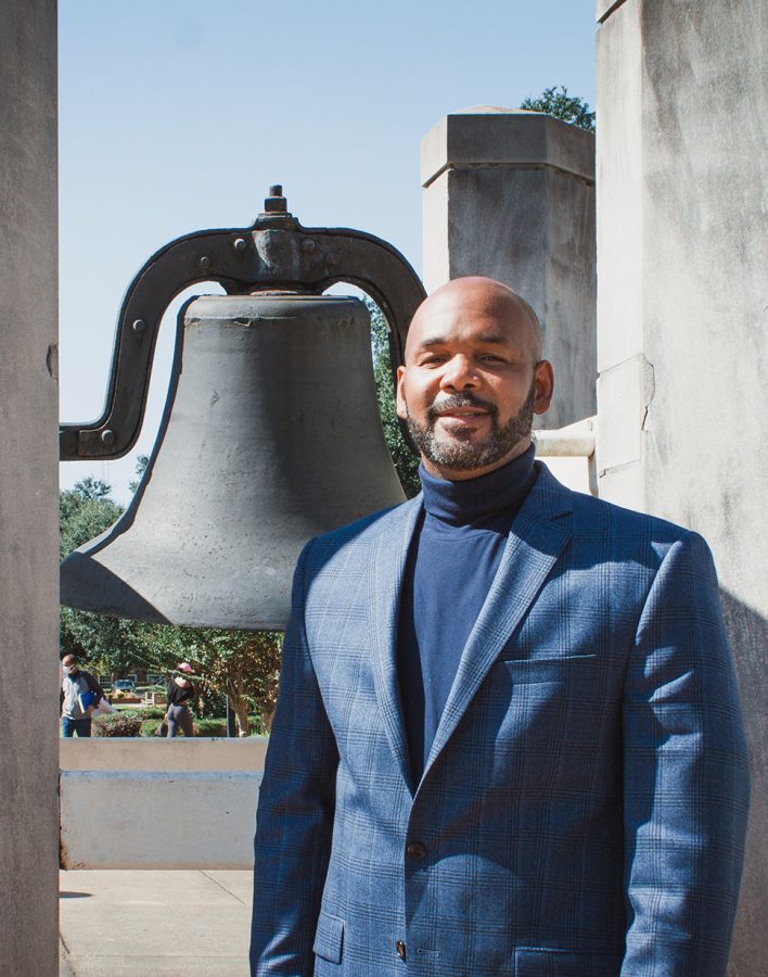Standing by the university bell in front of the Levi Watkins Learning Center on campus, alumnus Albert Russell reflects on the great times that he enjoyed while attending ASU.