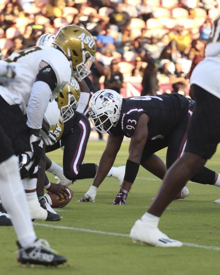 The ASU Hornet offensive line prepares to block the TSU Tiger defensive line on their opening drive.