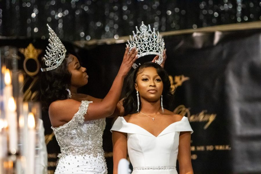 Toward the end of the Coronation festivities, Kendra Angion, Miss Alabama State University 2021-22, crowns Aleah Robinson, Miss Alabama State University 2022-23.  Robinson continues a legacy that started 83 years ago at Alabama State University.