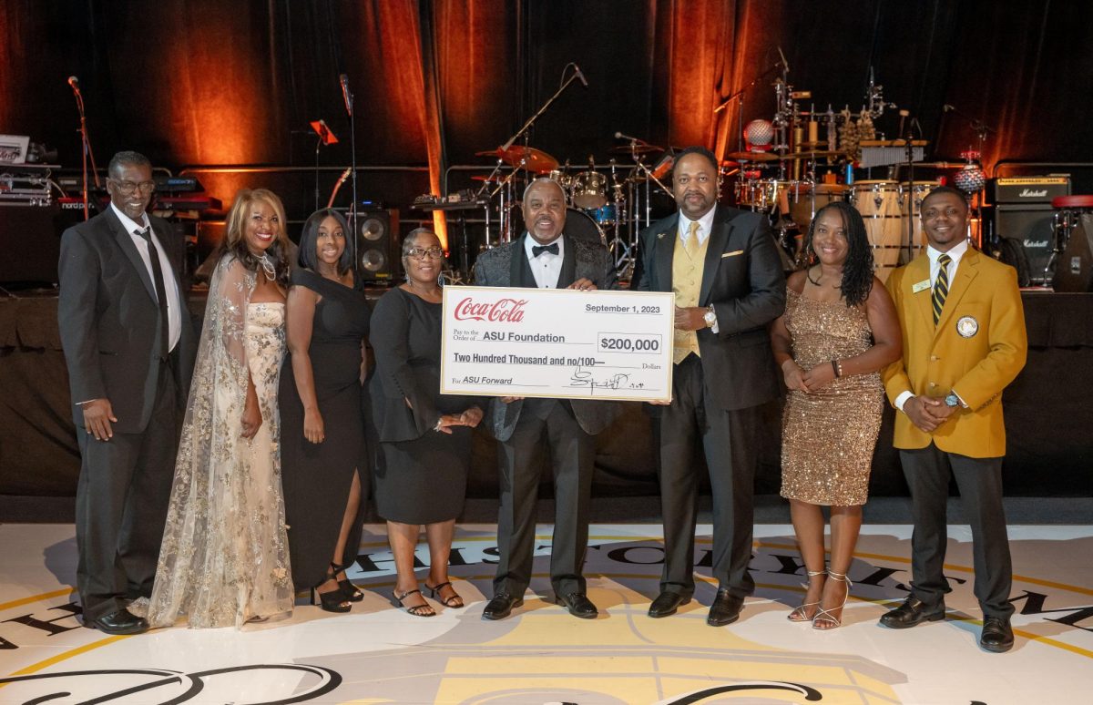 Trustee Board Chair Brenda Brown Dillard, ASU Foundation Chairman Antwon Hardwick and President Quinton T. Ross, Jr., Ed.D. are joined by members of the Coca Cola United as they presented a check in the amount of $200,000 during the President’s Gala.