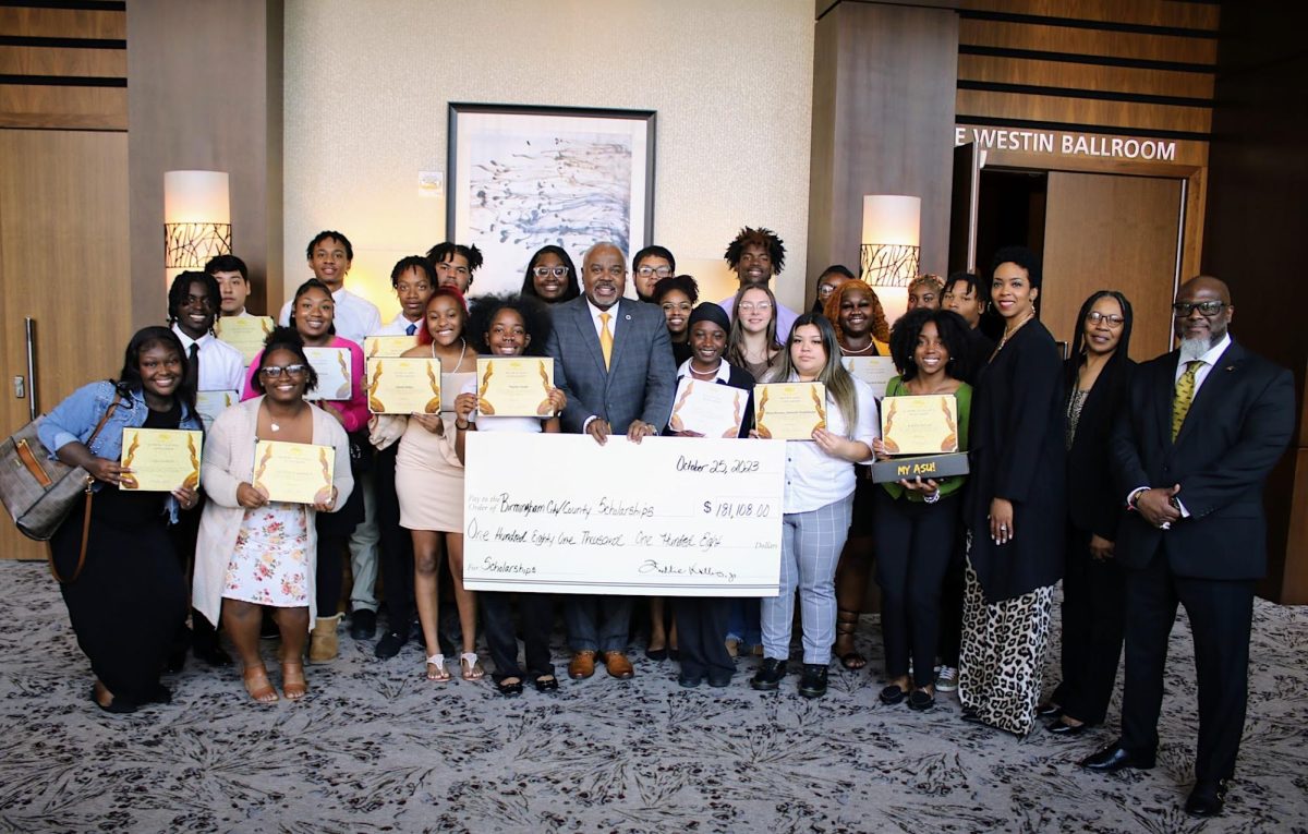 President Quinton T. Ross Jr. poses with area high school students in the Birmingham, Alabama area that received scholarships to attend ASU in the fall.  He is joined by Vice President of Student Affairs and Enrollment Management Malinda Swoope and Assistant Vice President of Student Affairs and Enrollment Management Freddie Williams.