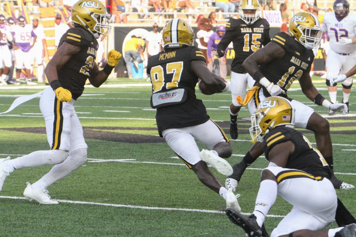 Alabama State University Hornets wide receiver Robert McMinn returns a punt for a 30-yard gain against the Miles College Golden Bears during the Sept. 9 matchup in Hornet Stadium.