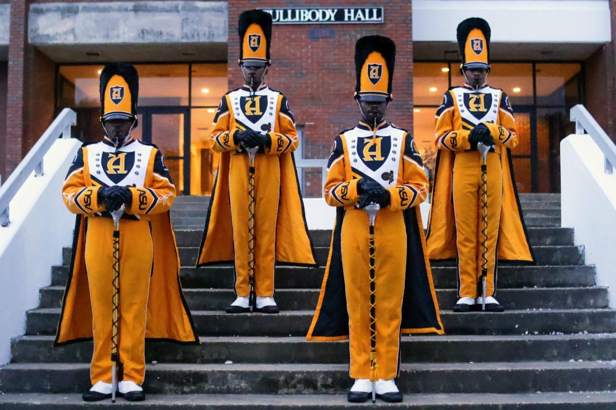 The 2024-25 edition of the Mighty Marching Hornet drum majors.  These four young men will be responsible for leading and managing the marching band during halftime shows and in the stands.