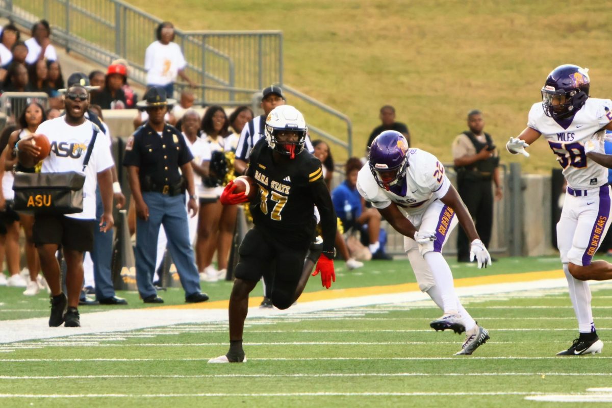 Alabama State University Hornet wide receiver Robert McMinn returns a punt for 58 yards against the Miles Golden Bears. McMinn has been a big weapon for the Hornets on kickoff and punt returns 