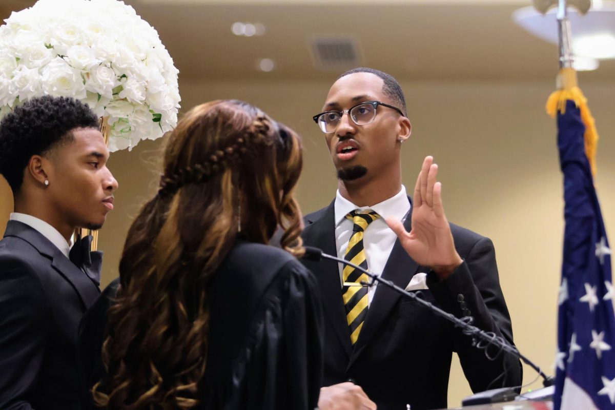 Birmingham native and rehabilitation studies major Landon Hale is sworn in for a second time as the 71st Student Government Association President of the Alabama State University student body.