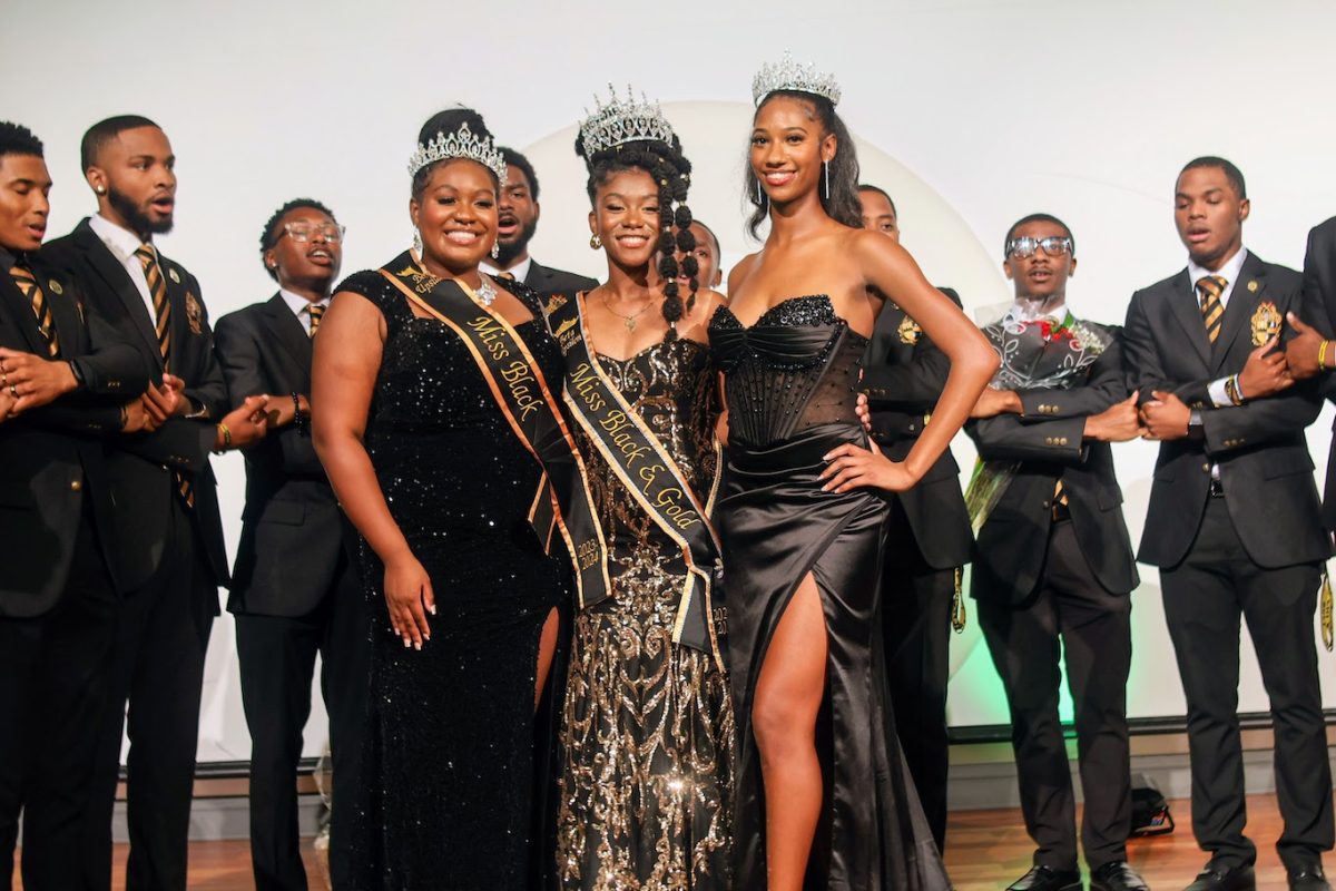 Serenaded by the brothers of the Beta Upsilon chapter of Alpha Phi Alpha Fraternity are Miss Black Morgan Tate, Miss Black and Gold Kourtney Savage, and Miss Gold Daryn Hill.  Savage will represent the fraternity at the distrct level.