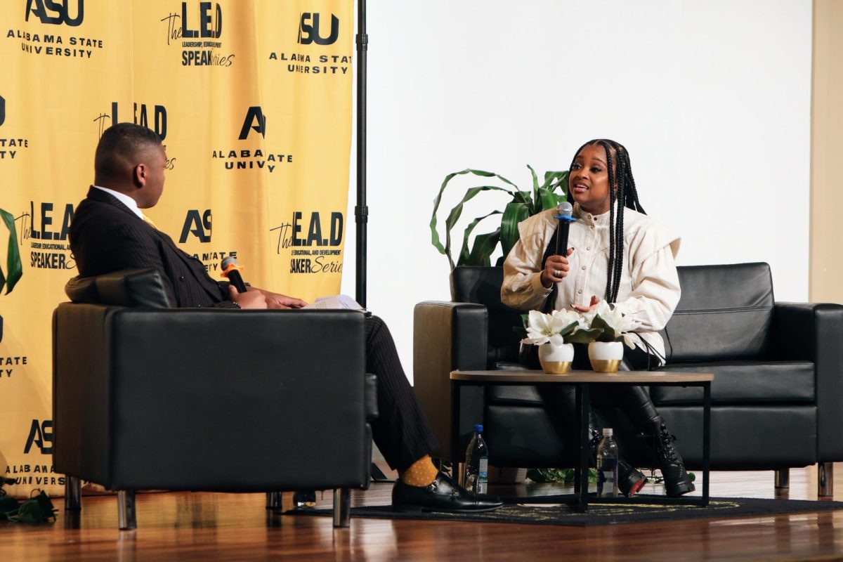 Senior finance major Tyrin Moorer (left) interviews social activist Tamika Mallory (right) regarding her leadership of the March on Washington and the struggles that she has encountered as a social activist. 