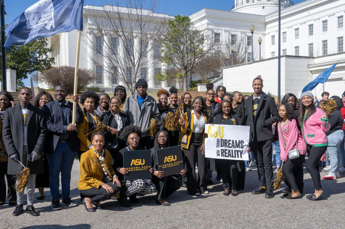 Members of the Alabama State University delegation take a minute to pose for the photographer as they demonstrated their support for better higher education funding during Higher Education Day.