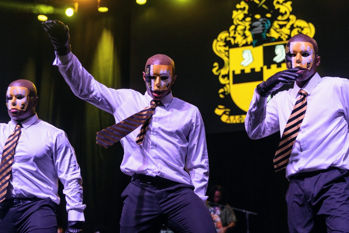 New members of Alpha Phi Alpha Fraternity, Inc. reveal themselves during the one-day membership reveal, held in the Dunn Oliver Acadome.